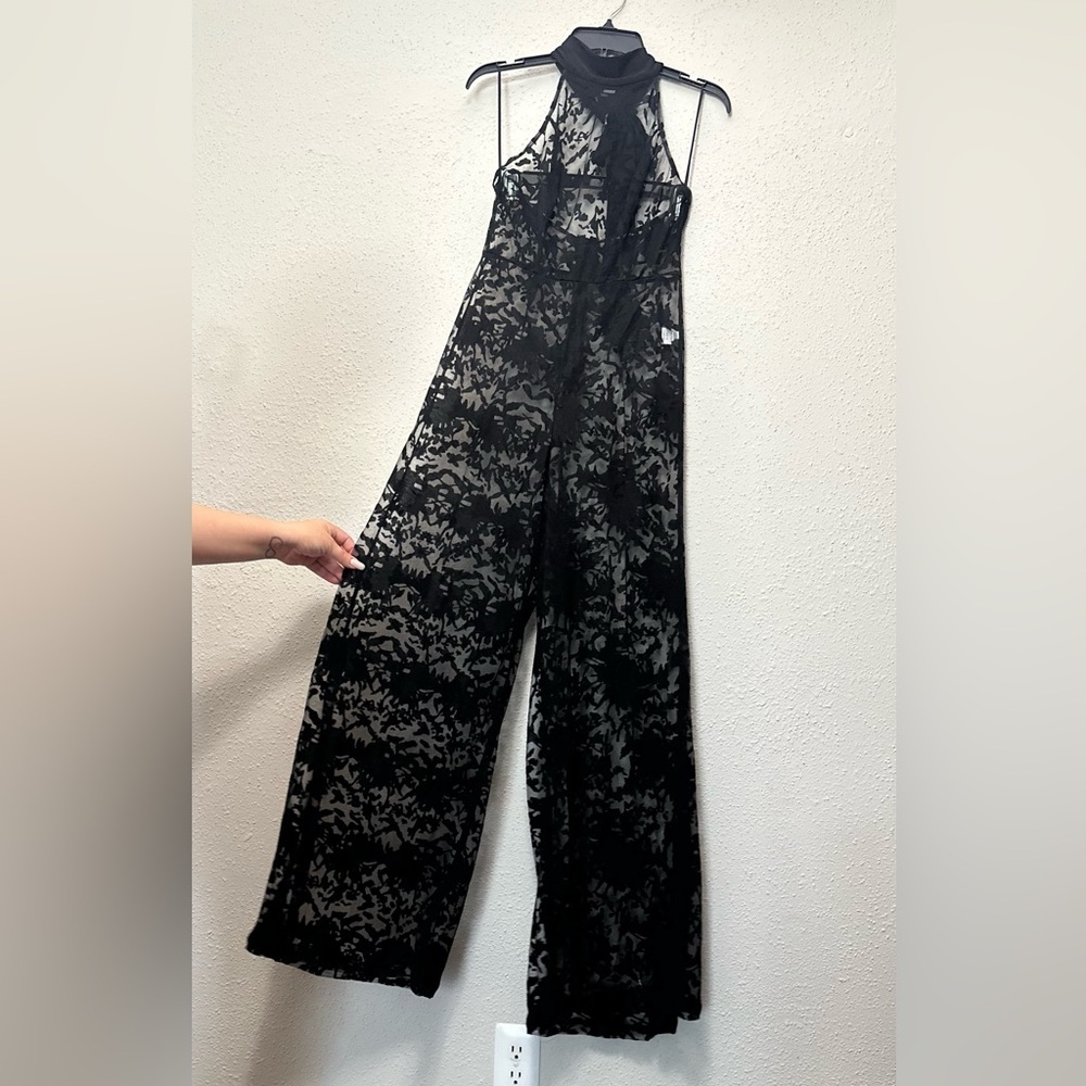 Black Lace Jumpsuit with Floral Pattern and Flowing Fit